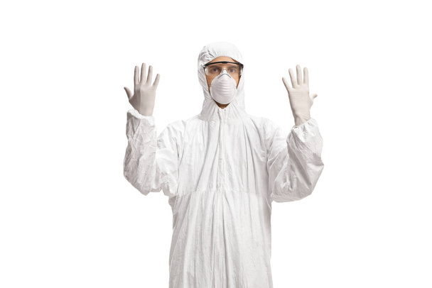 Man wearing a white protective suit and gloves isolated on white background - Photo, Image
