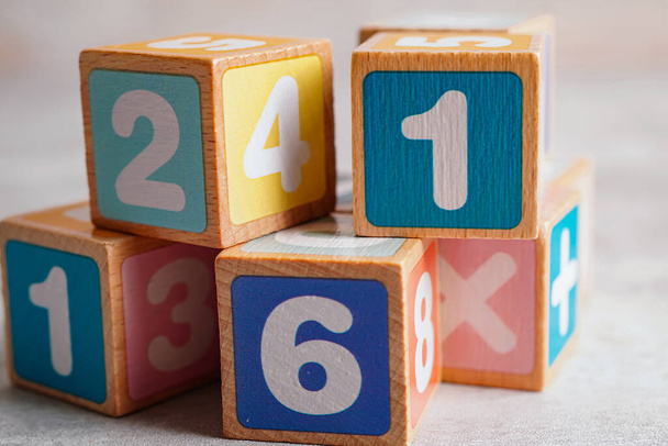 Math number colorful on wooden background, Education study mathematics learning teach concept. - Photo, Image