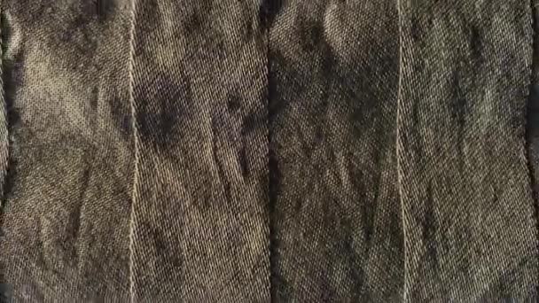 Natural abstract background of wrinkled sheet of grey color, vertical lines. - Footage, Video