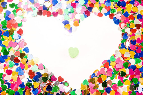 colorful heart shaped confetti on white background - Foto, afbeelding