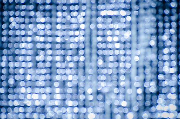 Beautiful bokeh lights on the blue background - Фото, зображення