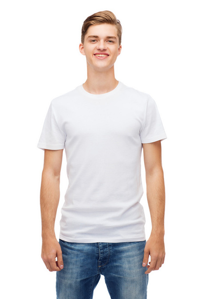 smiling young man in blank white t-shirt - Valokuva, kuva