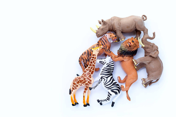 Plastic jungle animal toys on white background. - Fotoğraf, Görsel