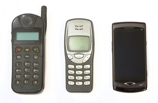 κινητά τηλέφωνα από τρεις γενιές - Φωτογραφία, εικόνα