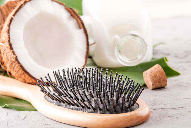 hair care concept with coconut oil on concrete background. High quality photo - Fotó, kép