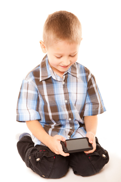 Little boy playing games - Foto, Bild