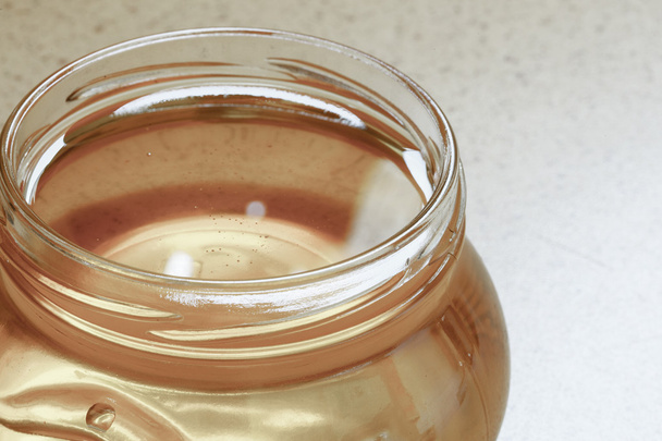 Jar of organic floral honey or syrup - Φωτογραφία, εικόνα