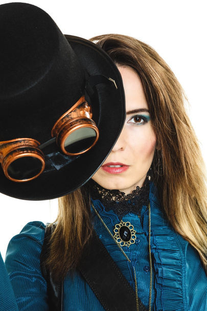 Portrait of beautiful steampunk woman isolated. - 写真・画像