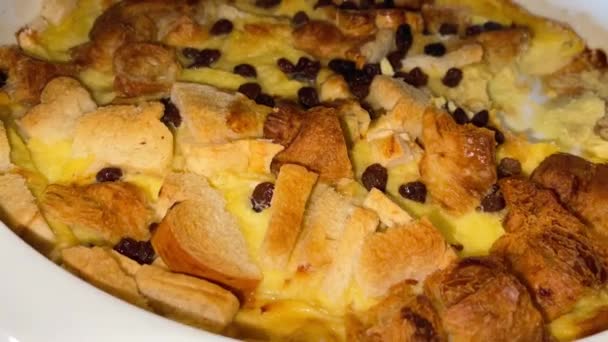 Delicious comfort food bread pudding, warm and milky fresh bread with punchy raisin tasting makes it the best cake - Footage, Video