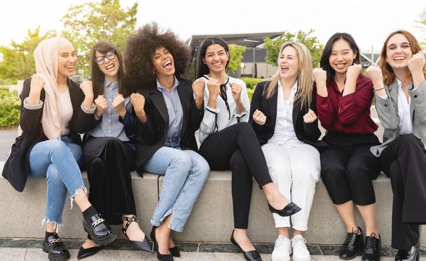 portrait multiracial business women happy, winning, celebration gesture, outdoors - Photo, Image