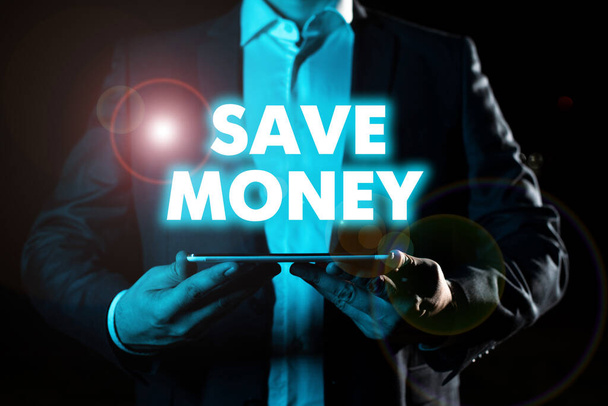Légende de texte présentant Économiser de l'argent, approche d'affaires stocker une partie de votre argent chaque mois pour les utiliser un peu plus tard -47010 - Photo, image