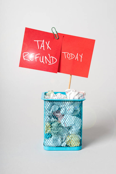 Inspiration showing sign Tax Refund, Business idea applied when money liability is less than the paid ones -48975 - Photo, Image