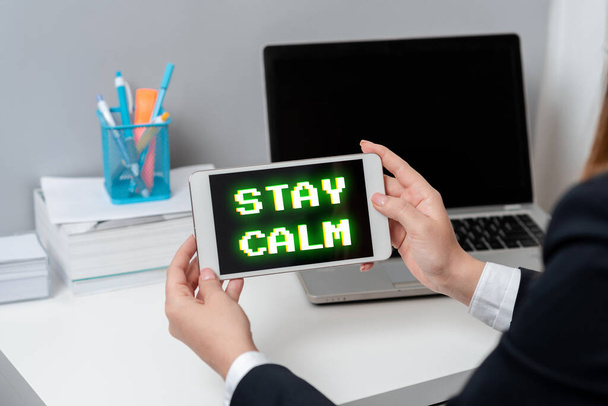 Sign displaying Stay Calm, Word for Maintain in a state of motion smoothly even under pressure -47522 - Photo, Image