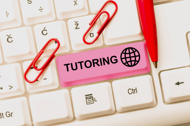 Sign displaying Tutoring, Concept meaning An act of a person employed to administer knowledge to someone -48622 - Photo, Image