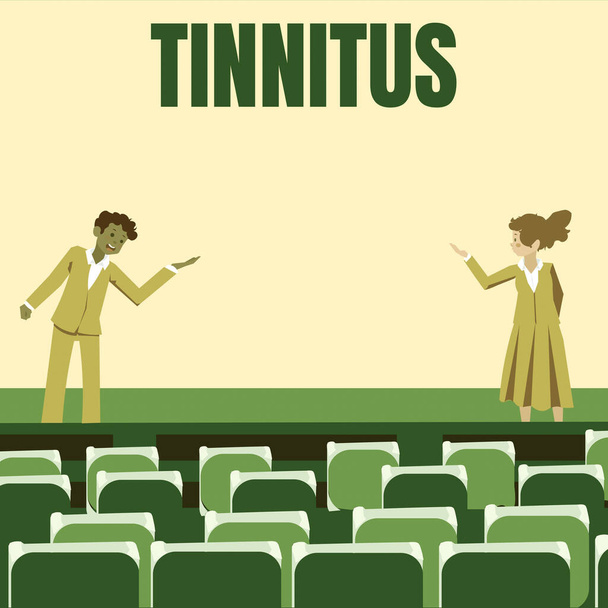 Text showing inspiration Tinnitus, Conceptual photo A ringing or music and similar sensation of sound in ears Male and female colleagues doing presentation on stage with hand gestures. - Photo, Image