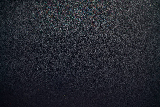 Genuine black cow fullgrain leather selective focus leather backgrounnd - Foto, Imagem
