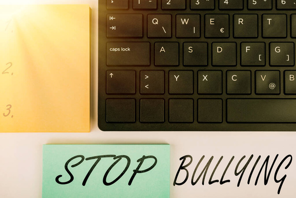 Conceptual caption Stop Bullying, Business overview Fight and Eliminate this Aggressive Unacceptable Behavior Computer Keyboard And Symbol.Information Medium For Communication. - Photo, Image