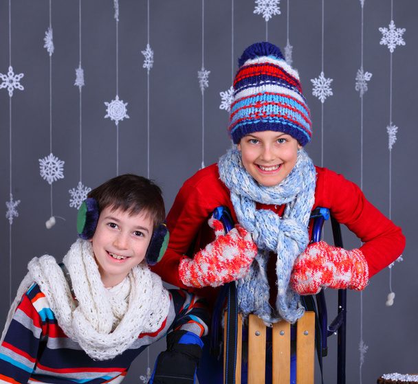 Winter Fashion. Adorable happy kids. - Zdjęcie, obraz