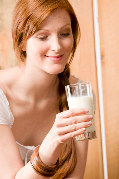 Young woman drink glass of natural milk - Fotoğraf, Görsel