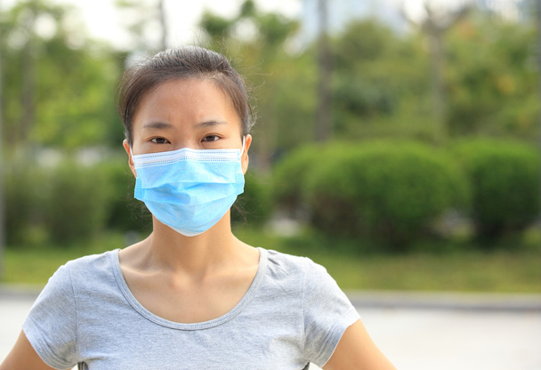 Asian woman wear face mask - Foto, Bild