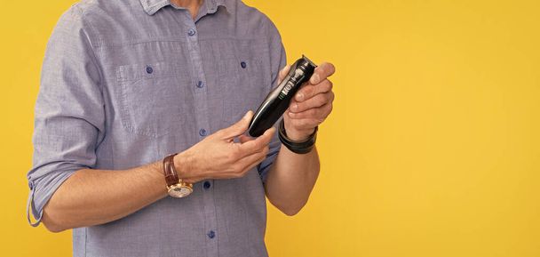 personal care and skincare. mens beauty. barbershop. man holding electric shaver. grizzled guy presenting electric razor. haircare and shaving. - Photo, Image