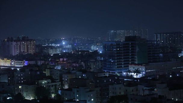 Ночная съемка городских зданий - Фото, изображение