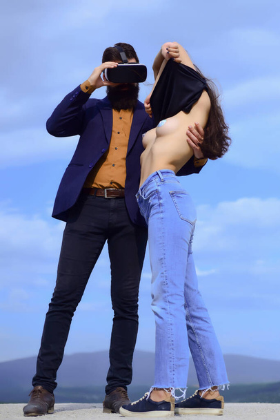 VR headsets, virtual reality. Couple playing digital technology - Fotó, kép