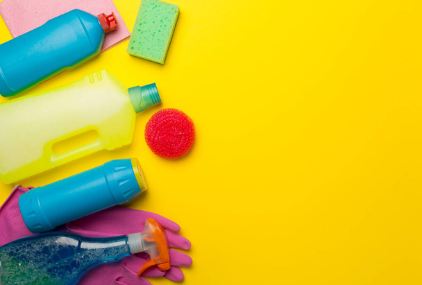 Many different house cleaning products on color background, top view. - Foto, immagini