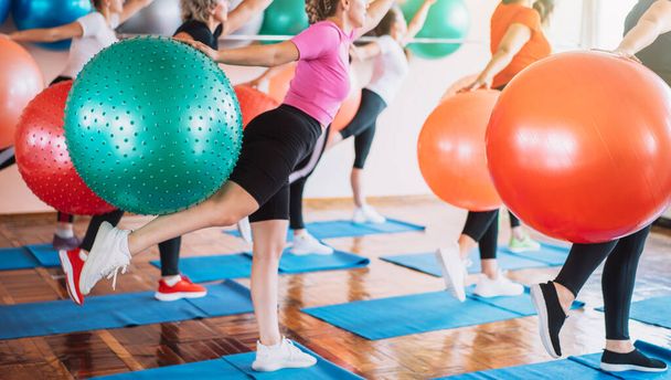 Group of women doing fitness with fitball. - Fotoğraf, Görsel