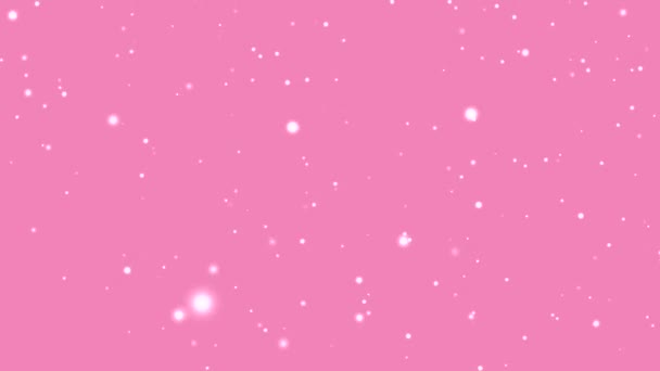Flocos de neve nevando no fundo rosa, design de neve de férias e conceito de fundo de Natal - Filmagem, Vídeo