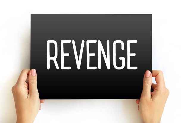 Revenge - hurt someone in return for being hurt by that person, text concept on card - Foto, afbeelding