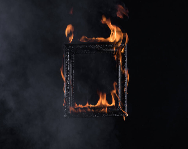 burning frame on black background - Photo, image