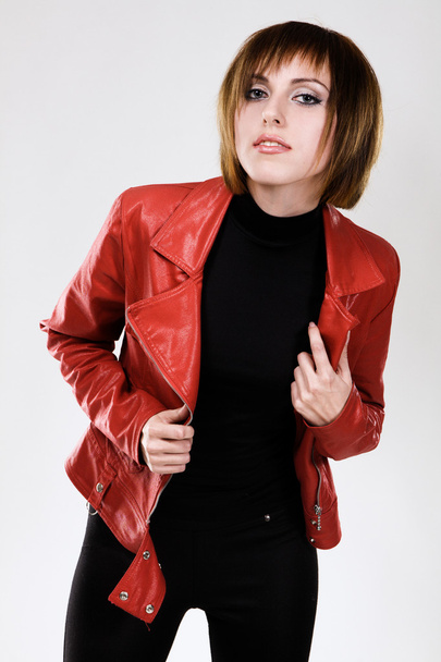 Beautiful model in red leather jacket - Фото, зображення