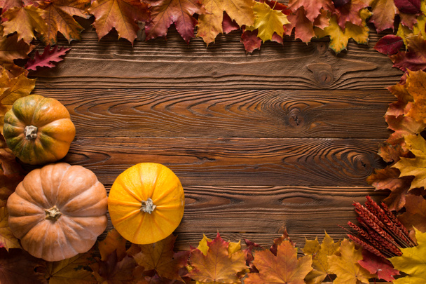 halloween pumpkins, autumn decorated wooden table. top view - Photo, Image
