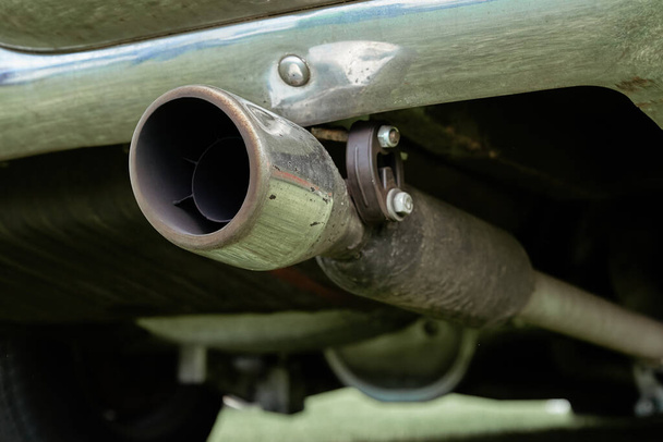 Car exhaust pipe. Old car muffler, close up - Photo, Image