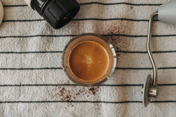 Close up of espresso coffee beautiful crema with coffee maker equipments. - Valokuva, kuva