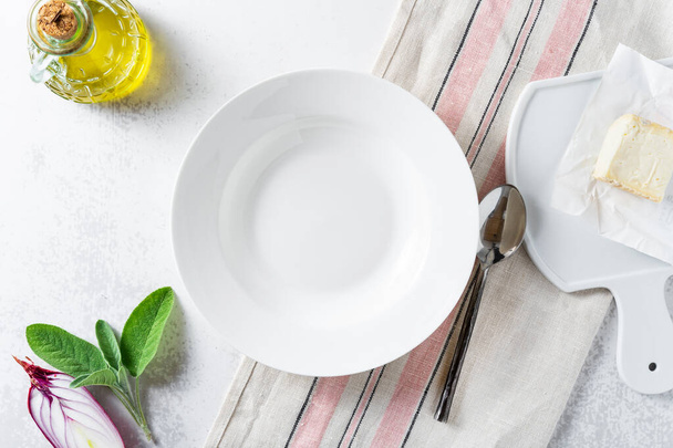 set of empty dishes on the table on a white background - Photo, Image