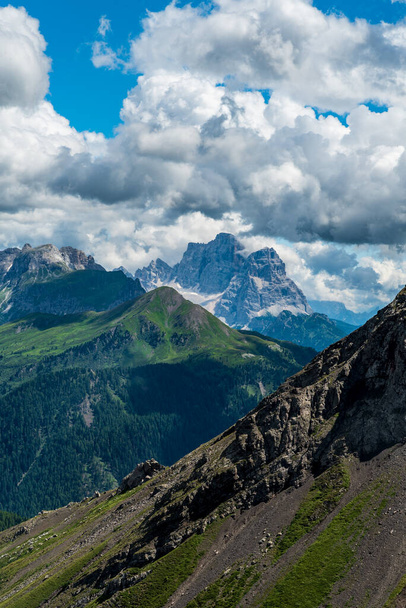Monte Pelmo, Monte Pore and Monte Cernera from Monte Sief mountain peak summit in Dolomiti mountains in Italy during beautiful partly cloudy summer day - Photo, Image