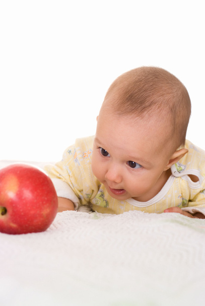 Bambino e una mela
 - Foto, immagini