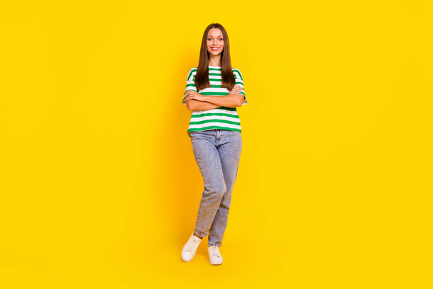 Full size photo of gorgeous friendly person crossed hands posing isolated on yellow color background. - Foto, Imagen