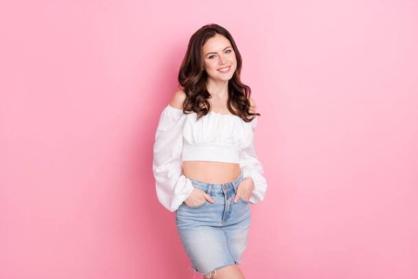 Photo of cheerful stunning young woman in stylish fashionable outfit enjoy spring weather isolated on pink color background. - Zdjęcie, obraz