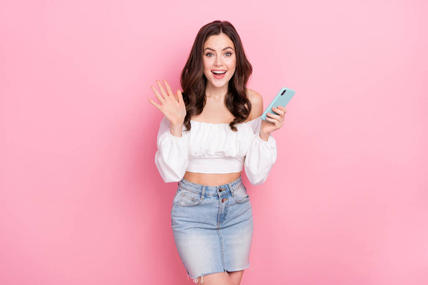 Photo of stunning amazed impressed lady influencer receive many likes feedbacks in her blog isolated on pink color background. - Foto, afbeelding