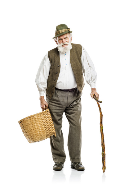 Old farmer man in hat holding basket - 写真・画像