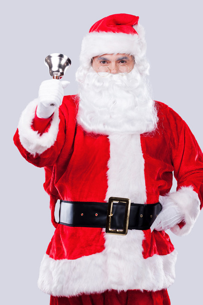 Santa Claus ringing a bell - Foto, Imagen
