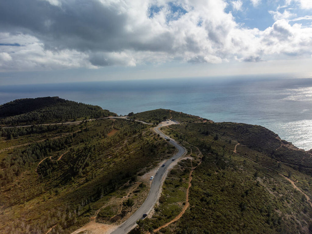 Touristic route D141 road from La Ciotat to Cassis, panoramic view on sandy limestone's cliffs and green pine forest, vacation in Provence, France - Photo, image