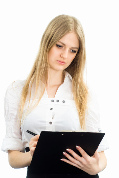 Young businesswoman writing - Photo, image