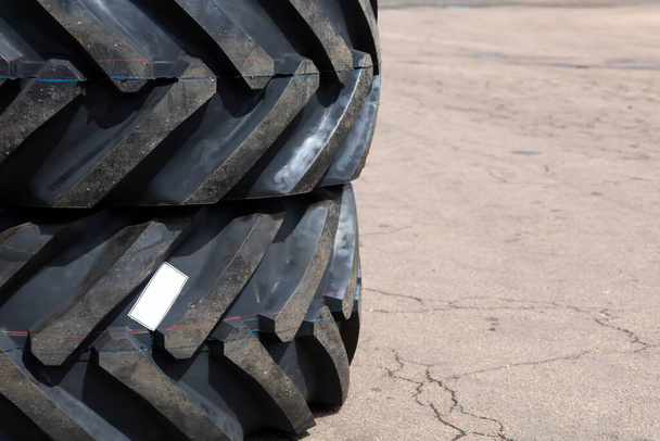 New rubber on the loader, rubber for the tractor. New rubber. High quality photo - Photo, Image