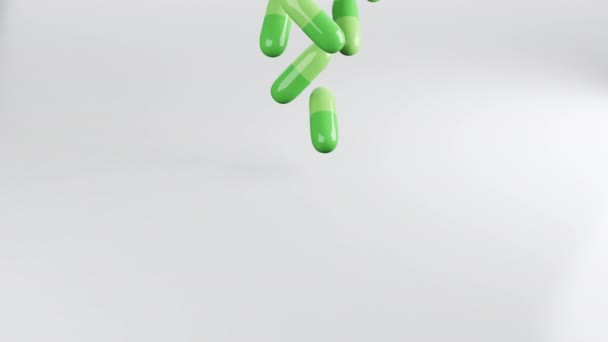 Close-up shot van groene pillen vallen op tafel farmaceutische industrie concept 3D rendering beweging close-up. - Video