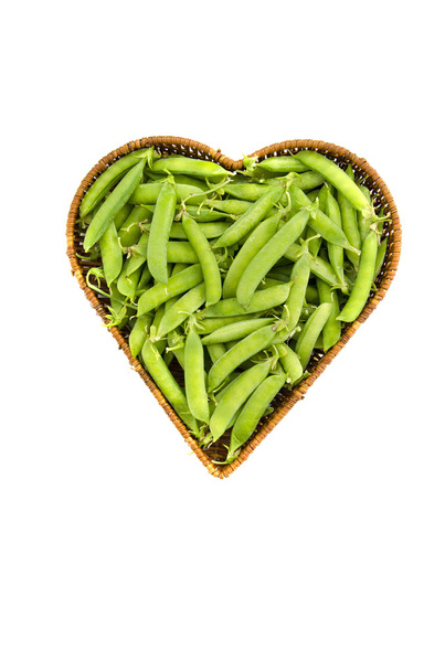 pea pods in heart form  basket isolated on white - Photo, Image