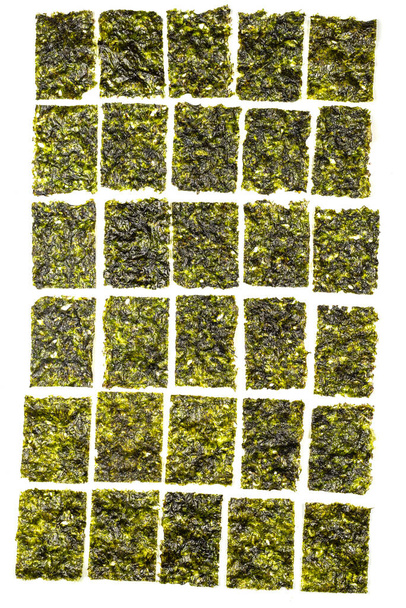 Tasty nori seaweed isolated on a white background.  - Фото, изображение